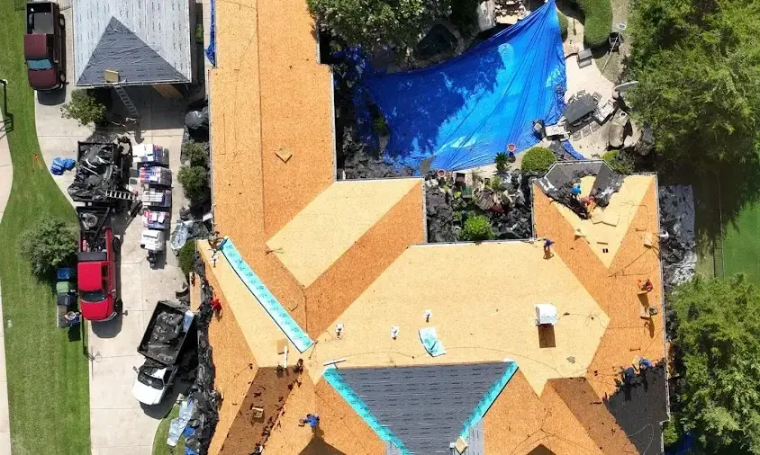 Professional Storm Damage Roof Repair being performed in Malta